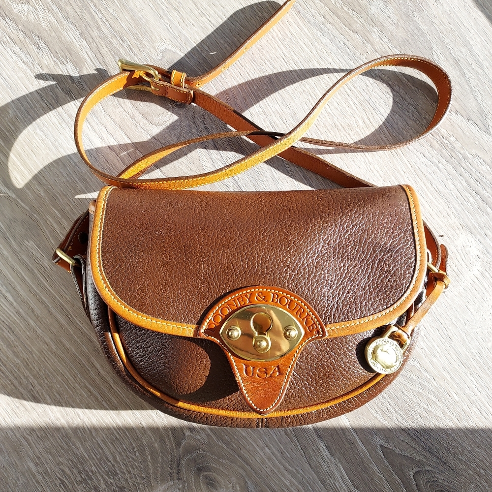 Vinatge all weather leather dooney and bourke crossbody bag